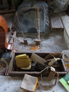 Tools of the gold pounder's trade.