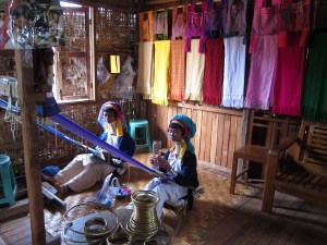 Kayan women weaving their traditional textiles.