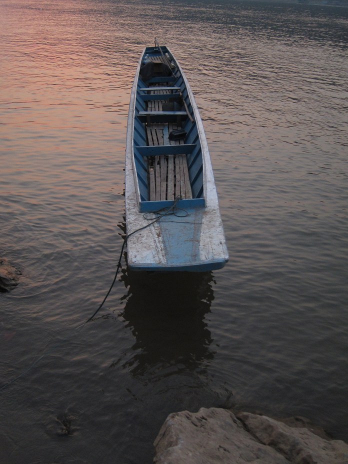 A veteran river vessel at rest after a hard day's work.
