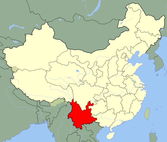 Public domain map of China, with Yunnan province highlighted in red.