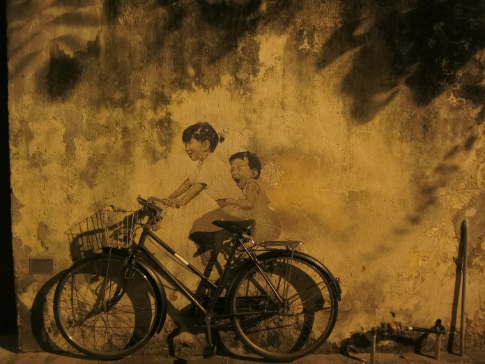 Children on a bicycle!